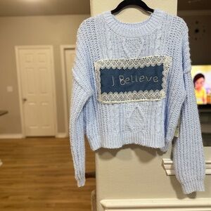 No Boundaries Light Blue Sweater with 'I Believe' Patch